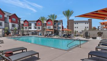our apartments have a swimming pool with lounge chairs and umbrellas at Weylyn Luxury Apartments, Arizona